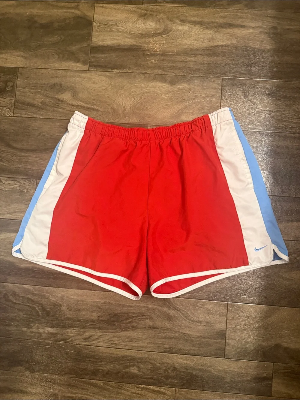 Nike Men’s Red Shorts with White Trim & Light Blue Panels